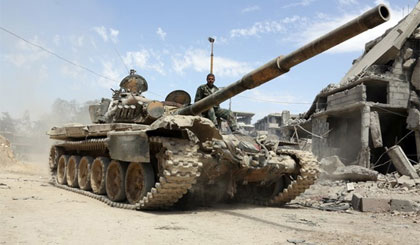Binh sỹ Syria trong chiến dịch truy quét phiến quân tại Douma. Nguồn: AFP/TTXVN