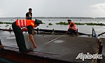 Bộ đội Biên phòng Tiền Giang mật phục bắt 2 phương tiện vận chuyển cát trái phép