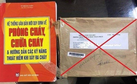 Bộ tài liệu PCCC được các đối tượng lừa đảo, nhằm chiếm đoạt tiền của người dân. Ảnh: C07, Bộ Công an